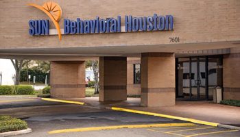 Mental health treatment facility entrance. Sun Behavioral Houston.